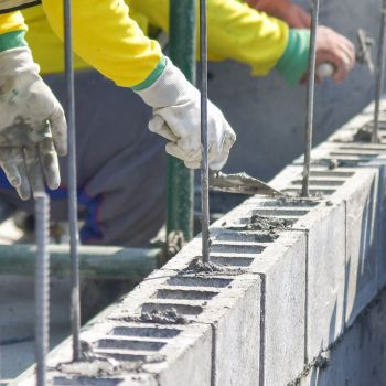 Photo of a Bricklayer working on a block fence in Ascot, Brisbane