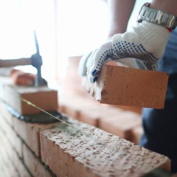 Photo of a bricklaying laying a retaining wall New Farm, Brisbane